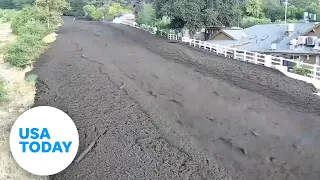 Heavy mud, debris floods community in California; one person dead | USA TODAY