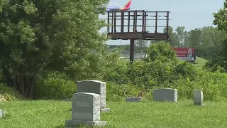 Billboards start coming down near Washington Park Cemetery after year-long court battle