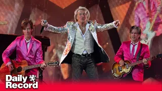 Rod Stewart delights fans at Edinburgh Castle despite seeing the rain