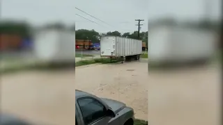 Union Pacific vs Semi - Train rams truck stuck on tracks