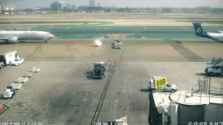 Dash 8's Prop Wash Blows Baggage Dolly into United 737 at LAX