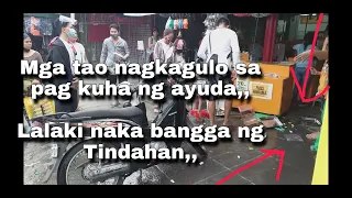 Mga tao NAGKA GULO SA AYUDA Lalaki naka bangga ng Tindahan,,