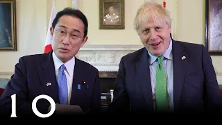 Boris Johnson observes an RAF fly-past with the PM of Japan Fumio Kishida