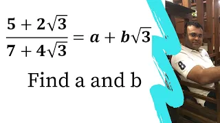 Find rational numbers a and b such that 5 + 2 Root 3/ 7 + 4 Root 3 = a + b root 3