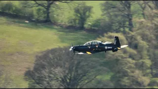 An RAF Hawk T2, RAF Texan and RAF Phenom on a windy day over Ullswater in the Lake District UK.