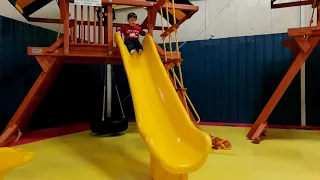 Sasuke going down the slide at Play N Wisconsin