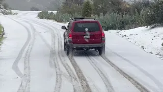 Leading edge of rare snow storm arrives in Santa Barbara hills