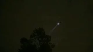 Police Helicopter Circling at Night with Instructions Over Loudspeaker