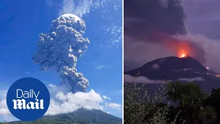 Indonesian volcano erupts forcing residents to flee as ash spews out