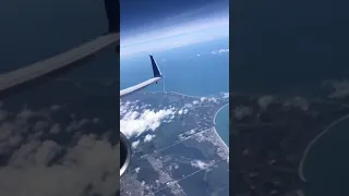 Airline passengers sees Atlas V rocket launch during flight (Raw Video)