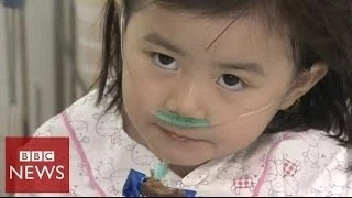 Video shows 6 year-old rescued from sinking ferry in South Korea - BBC News