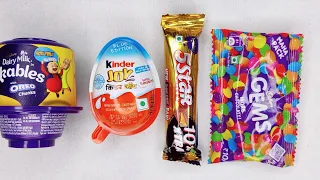 Kinder joy Vs Lickables unpacking I Gems vs Lots of candies