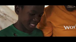 How does World Vision's transformational development model work?