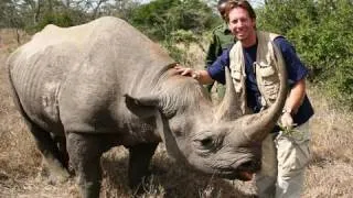 MAN MEETS WILD RHINO!