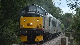 ROG 37601 Drags 755420 past a crossing outside of Wymondham Abbey 20/08/2019