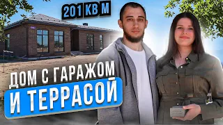 Дом с террасой и гаражом