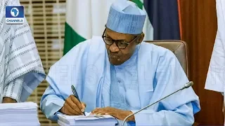 Buhari Signs 2019 Budget