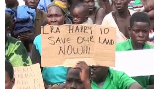 Amuru women strip before ministers in protest over land