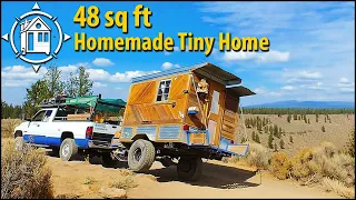 DIY homemade camper & 400 sq ft garage is his tiny home life