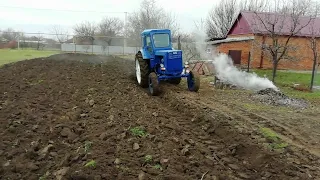 Plowing with a tractor t 40.  The best tractor for plowing the garden.