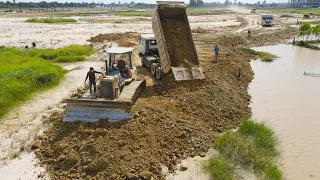 Excellent Dump Truck Transport Soil and Bulldozer Komatsu D48P Push Stone, Soil to Water Build Road