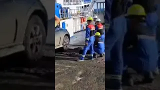 driving onto barge in rough seas