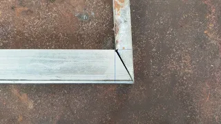 Professional welder cutting metal