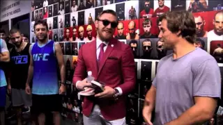 Uriah Faber Gifts Flip Flops to Conor McGregor