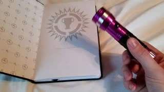 Black Light on Journal #3 from #GTMerchMystery