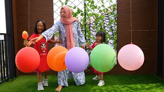 Surprise Treasure Inside a Balloon - Finger Family Song Learn Color with Balloon
