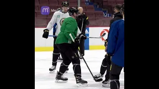JT Miller and Nils Aman practice face off