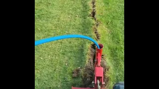 Laying MDPE Water Pipe with the Pipe Layer and Kubota Compact Tractor