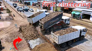 First Floor Cluttering Stone Soils Filling By Tipper Trucks And Clutter By Caterpillar D4C Bulldozer