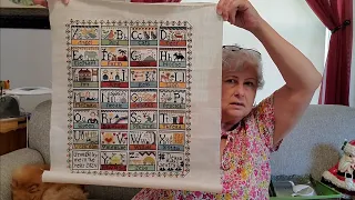 flosstube #30  vacation cross stitch haul, finishes, wips, thrift haul