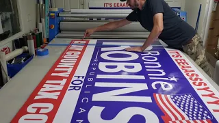 Mounting printed vinyl on 4x8 sheets of coroplast, using a laminator