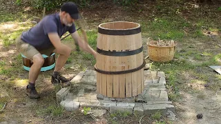 Constructing a beer barrel with hand tools.