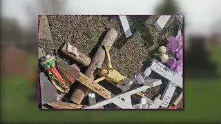 Families furious after crosses, decorations from gravesites were found in pile at Resurrection Catho