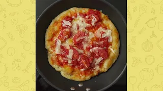 PAN-COOKED PIZZA WITH TOMATO, BASIL AND GRANA PADANA RISERVA