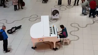 Open piano for refugees at WIEN MITTE The Mall, Vienna