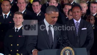 OBAMA W NAVAL ACADEMY FOOTBALL TEAM WALK UP