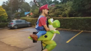 Mario Riding Yoshi Riding a Unicycle and Playing Flaming Bagpipes