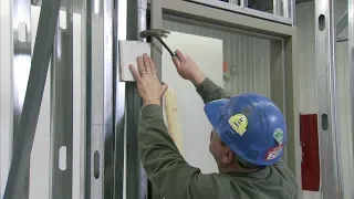 How to Install a Steel Door Frame in Steel Stud Construction