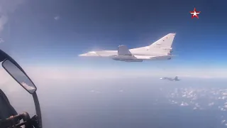 Russian Navy Tu-22M3 and Su-30SM based in Syria patrol over the Mediterranean Sea