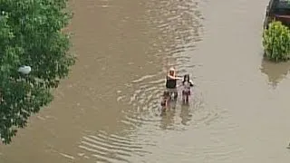 Heavy rain pounds Midwest, bringing record floods