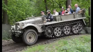 A group of Sd.Kfz 10 driving through the wood