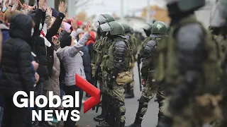 Belarus protests: Police fire warning shots as tens of thousands flood Minsk streets