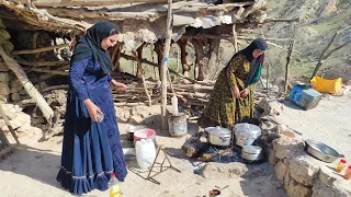 Stone kitchen stories: nomad women make stew with fresh local quails in the village of iran