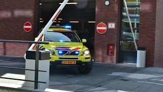 Politie, MMT01 en verschillende ambulances met spoed in Amsterdam op koningsdag 2015