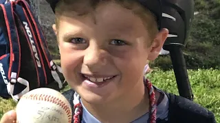 8 year old hits HOME RUN over the fence!