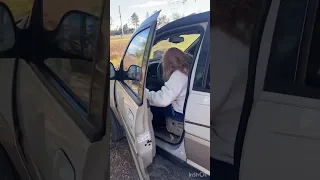 How to not get a static electricity shock when getting out of a car on a cold day.